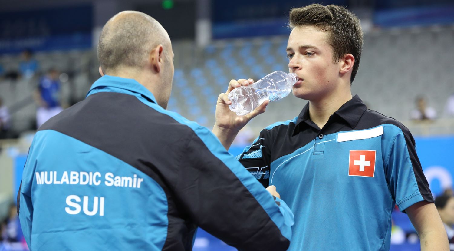 Elia Schmid mit Coach Samir Mulabdic, Photo: Swiss Olympic